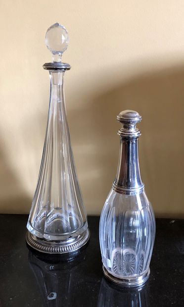 Three crystal decanters and silver mount....