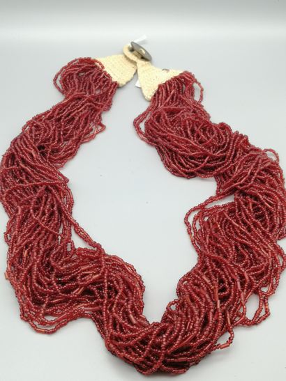 Naga necklace, composed of a braid of red...