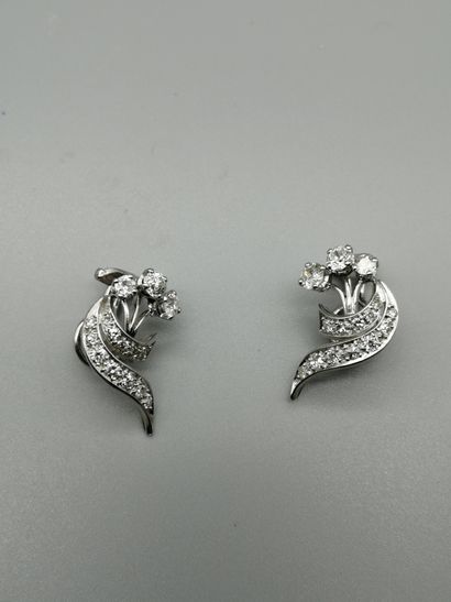 Pair of 18K white gold 750‰ ear clips, adorned...