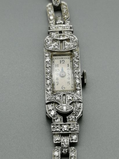 null Ladies' wristwatch, the case is in 800‰ platinum of rectangular shape, set with...