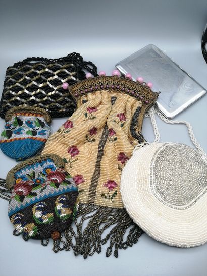 Lot of bags and purses made of woven glass...