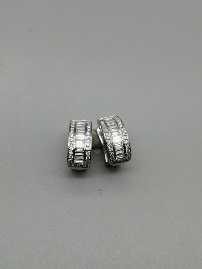 A pair of 18K white gold 750‰ ear clips,...
