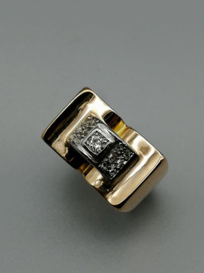 null An 18K 750‰ two-tone gold ring, of geometric form, set with an old-cut diamond...