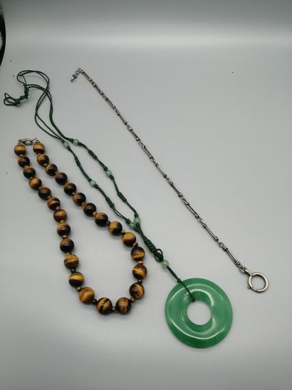 Lot including: 
A tiger's eye quartz necklace,...