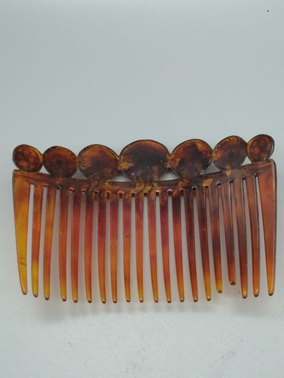 null Set of two tortoiseshell combs decorated with gold discs and studded with white...