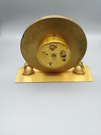 null Lot including :


- Clock, desk alarm clock, signed IMHOF in gilt bronze, round...