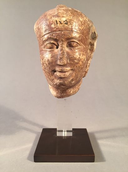 Sculptor's model of a male head wearing the...
