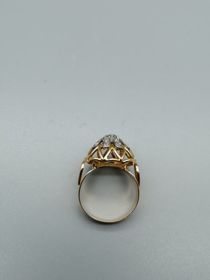 null Dome ring, openwork in 18K two-tone gold 750‰, in the center a brilliant-cut...