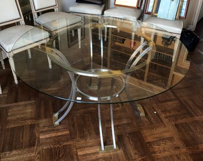 null House BAGUES

Round dining table with metal structure and glass top.

Work of...