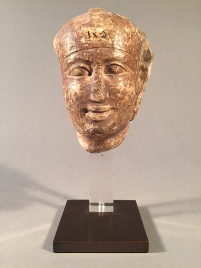 null Sculptor's model of a male head wearing the tripartite headdress and the uraeus....