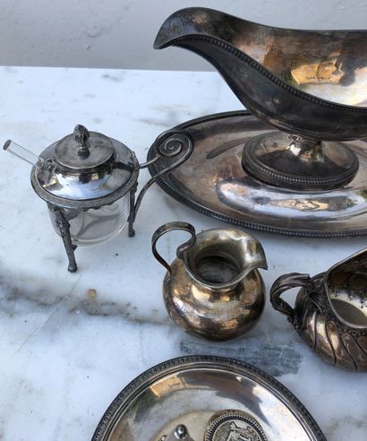 null A set of silver coins comprising:

- A marabout coffee pot, 1st title 925 ‰,...