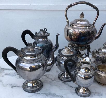 null Two silver plated tea and coffee sets, one in the Empire style, each including...