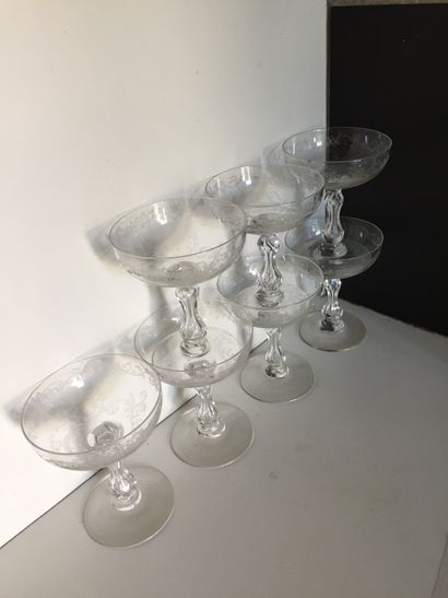  Various parts of engraved crystal glasses services. About 60 glasses. 
 
Two goblets...