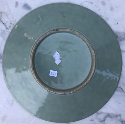null Three celadon glazed Chinese stoneware dishes, one with underglaze decoration...