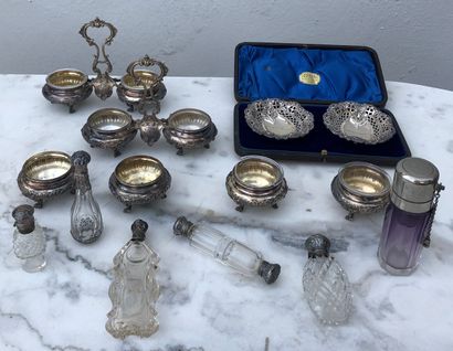 null Set of 8 silver saltcellars with white glass interior and rocaille decoration,...
