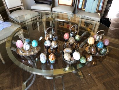 null Silver plated lot including four egg cup display stands and their spoons.

A...