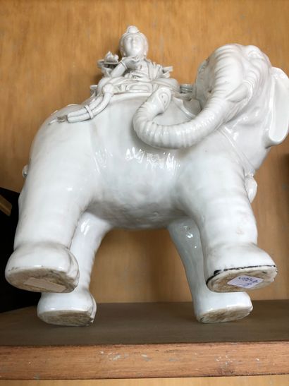 null CHINA

Divinity riding an elephant.

White glazed porcelain.

Small chips and...