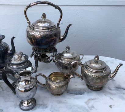 null Two silver plated tea and coffee sets, one in the Empire style, each including...