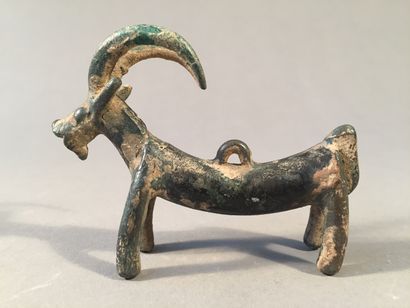 null Large pendant representing a goat. Bronze. Gaps. Luristan, 7th-6th century B.C....