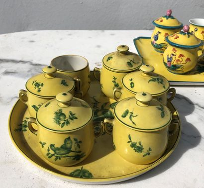 null Two sets of cream pots, one comprising 6 cream pots and a tray in Limoges porcelain...