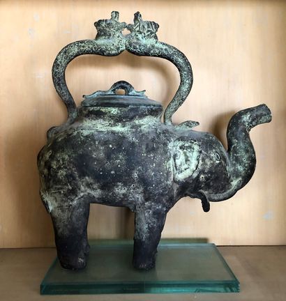 null Work in the taste of CHINA

Metal jug in the shape of an elephant.

H. 29 c...