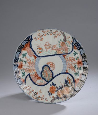 null Imari porcelain dish with contoured edges decorated with flowering branches....