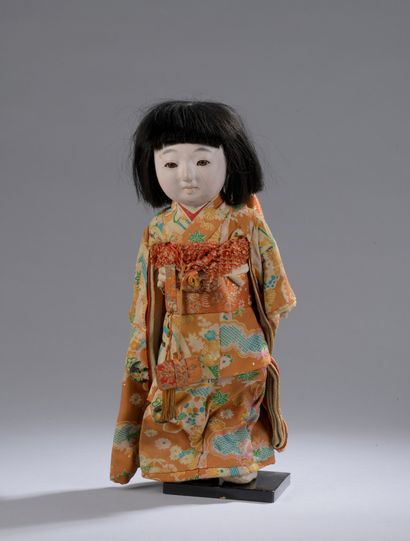 null DOLL made of fabric and wood painted in natural colour representing a woman...