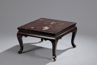 null LOW TABLE in red lacquered wood decorated with a figure in a landscape of reeds...