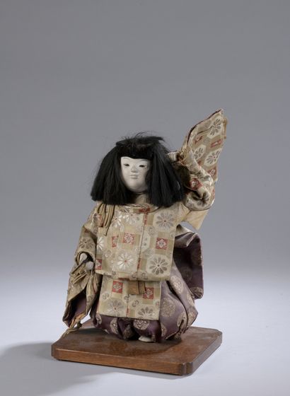 null DOLL made of fabric and wood painted au naturel representing a woman holding...