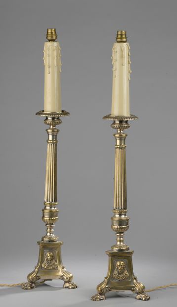 null Pair of gilded metal stands decorated with the faces of Christ, the Virgin and...