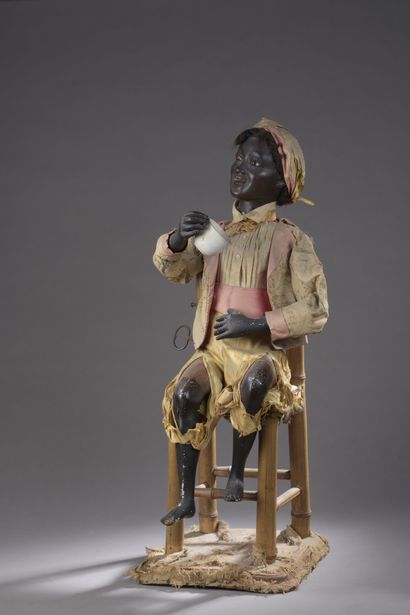 null ROULLET DECAMPS, 1900-1910 

Young man from New Orleans sitting on a bamboo...