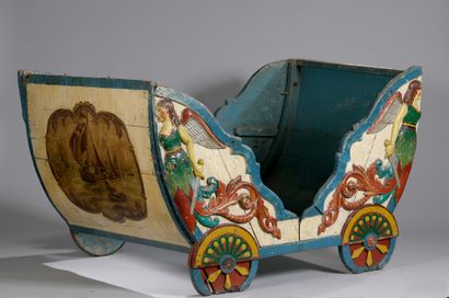 null Carved and polychrome wood carriage decorated with two winged women holding...