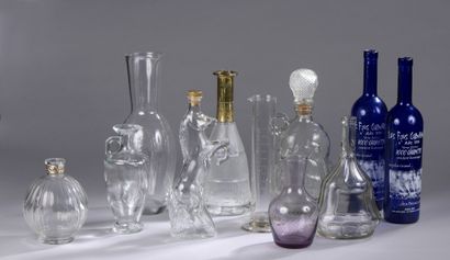 LOT of about ten decanters, one of which...