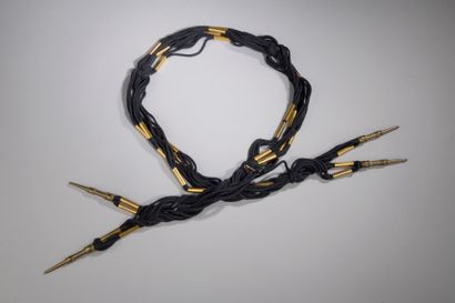 null Yves SAINT-LAURENT Paris

Belt with marine passementerie, tubes and spindles...