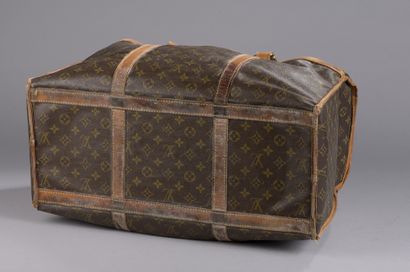 null Louis VUITTON

TRAVEL BAG in natural leather and Monogram canvas. Name tag....
