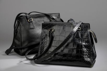 null Sonia RYKIEL

TWO HANDBAGS, one in black leather lizard style and the second...