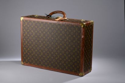 null Louis VUITTON

ALZER RIGID CASE in natural leather and Monogram canvas. Numbered...