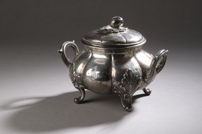 null DEBAIN 

A 925‰ first-title silver JUG, standing on four legs, the body chased...