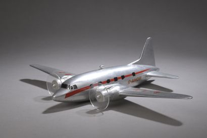 null REDUCED MODEL OF A TRAVEL AGENCY AIRCRAFT featuring a twin-engine cast aluminum...