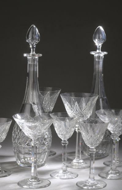 null A cut crystal GLASS SET, including two decanters and twenty-eight glasses, some...