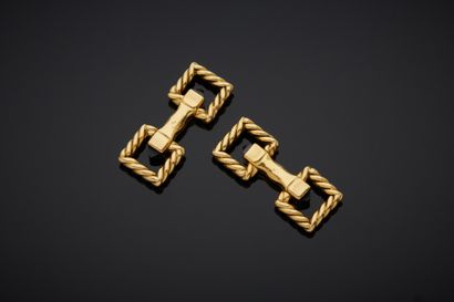 null CARTIER Paris - A pair of 18K yellow gold 750‰ double cufflinks, adorned with...