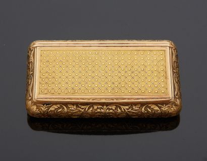 null An 18K yellow gold 750‰ snuffbox of rectangular form with foliate decoration...