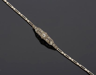 null 14K white gold bracelet 585‰, adorned with a geometrically decorated element,...