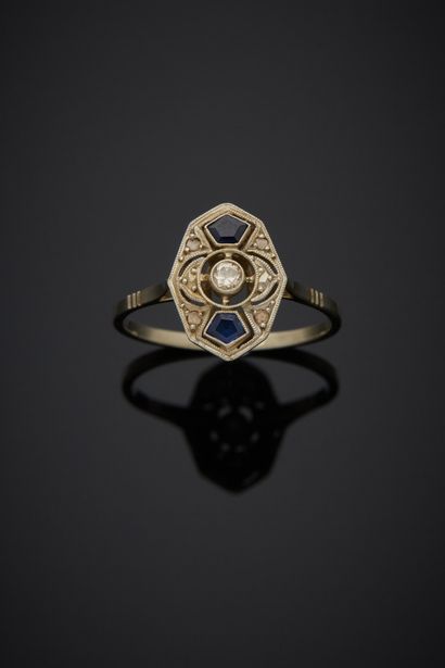 null An 18K white gold 750‰ marquise ring, adorned with calibrated sapphires, a diamond...