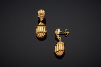 A pair of 18K yellow gold 750‰ earrings,...