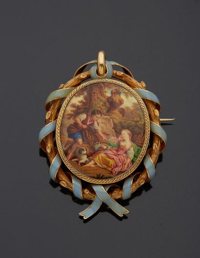 null An 18K yellow gold 750‰ brooch, oval in shape, adorned with a gallant scene...
