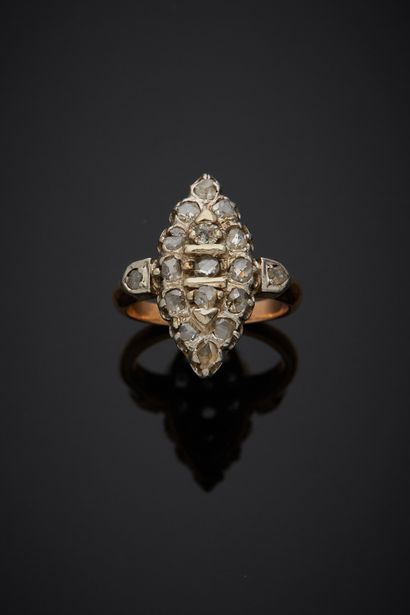 null An 18K yellow gold 750‰ and platinum 850‰ marquise ring, set with rose-cut diamonds.

Finger...