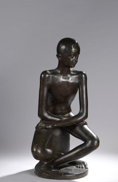 DELZOZZO (20th century) 
Young boy sitting,...