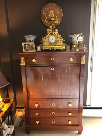 null Mahogany and mahogany veneer straight desk opening by a flap and three drawers,...
