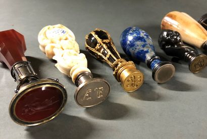 null 
7 seals, one in gold and smoked glass signed "P.BOUCHERON PARIS", gross weight...